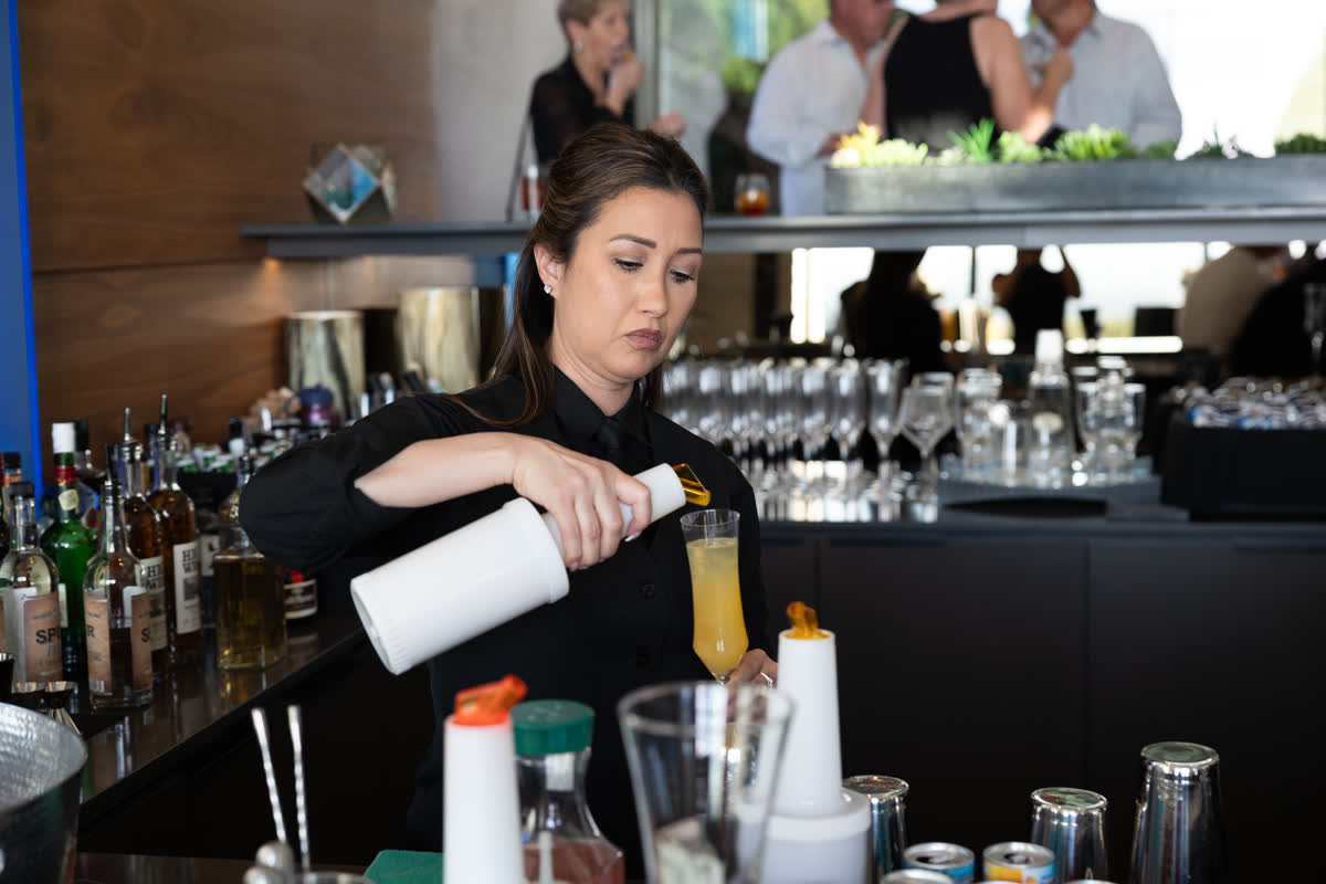 Bartender crafting a cocktail