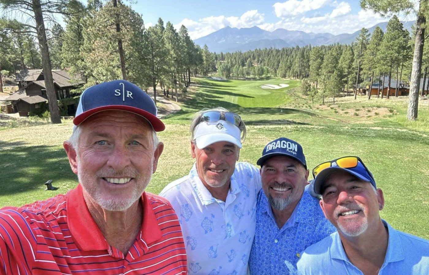 Golfers celebrating on course